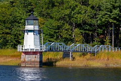 Doubling Point Light Tower at End of Wooden Walkway
